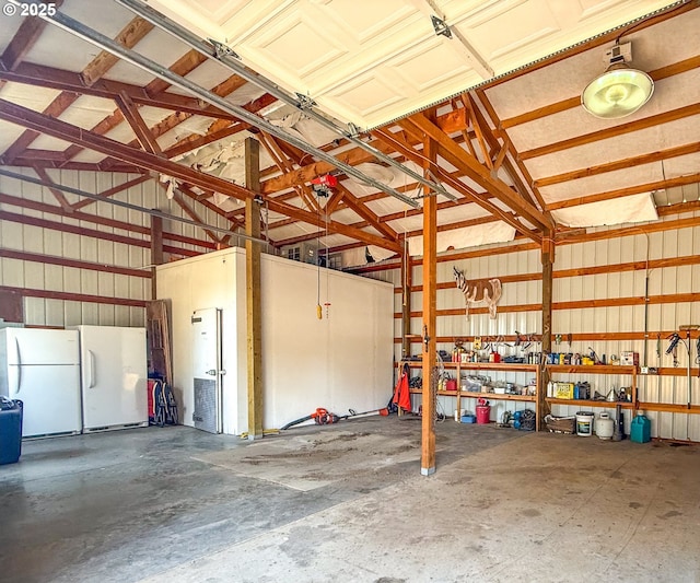 25405 SE Bear Creek Rd, Prineville, OR 97754 - garage featuring freestanding refrigerator