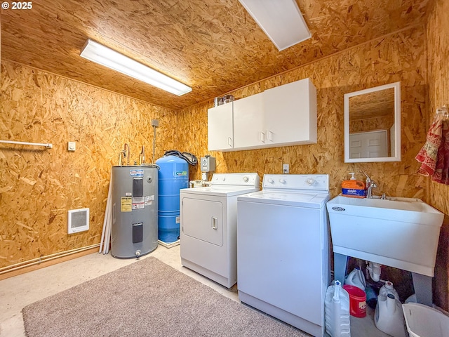 25405 SE Bear Creek Rd, Prineville, OR 97754 - laundry area featuring cabinet space, independent washer and dryer, a sink, water heater, and visible vents