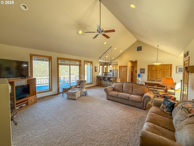 25405 SE Bear Creek Rd, Prineville, OR 97754 - living area with visible vents, ceiling fan, high vaulted ceiling, recessed lighting, and carpet flooring