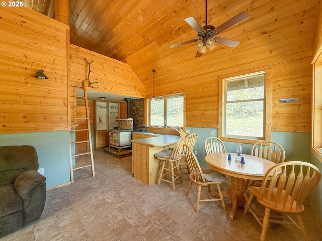 25405 SE Bear Creek Rd, Prineville, OR 97754 - dining room with wood walls, wood ceiling, a ceiling fan, and lofted ceiling