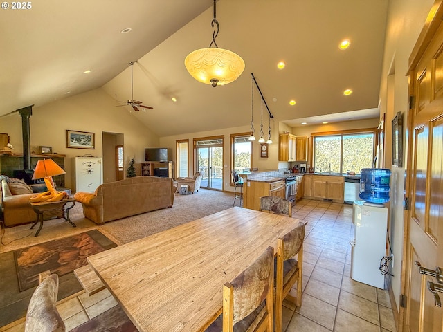 25405 SE Bear Creek Rd, Prineville, OR 97754 - dining area featuring plenty of natural light, a ceiling fan, recessed lighting, and high vaulted ceiling