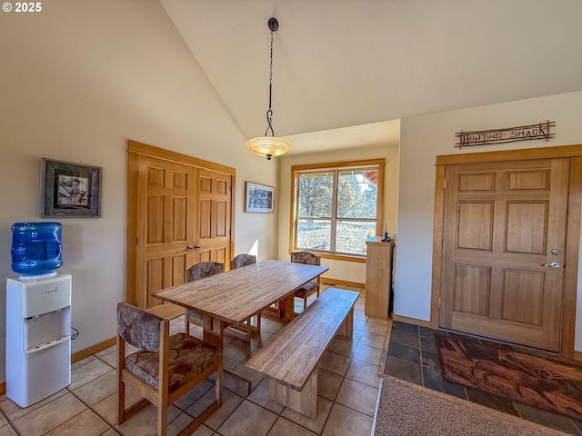 25405 SE Bear Creek Rd, Prineville, OR 97754 - tiled dining area featuring baseboards and high vaulted ceiling