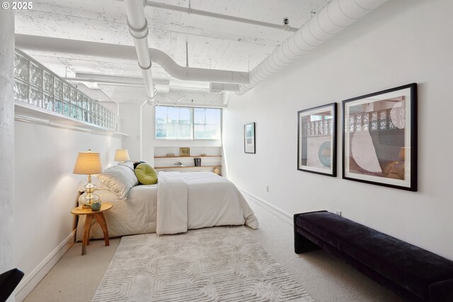 1314 NW Irving St Unit 404, Portland, OR 97209 - bedroom featuring carpet and baseboards