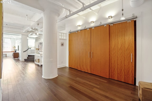 1314 NW Irving St Unit 404, Portland, OR 97209 - interior space with hardwood / wood-style floors and ornate columns