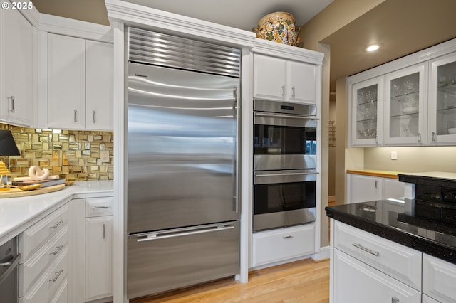12760 S Fielding Rd, Lake Oswego, OR 97034 - living area with recessed lighting, a fireplace, and light wood-type flooring