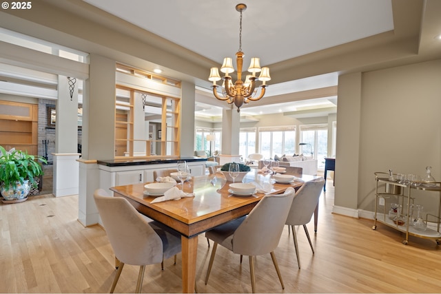12760 S Fielding Rd, Lake Oswego, OR 97034 - kitchen featuring a center island, recessed lighting, white cabinetry, light wood finished floors, and stainless steel gas stovetop