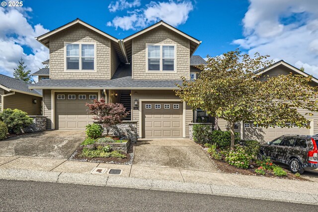 view of front facade with a garage and concrete driveway