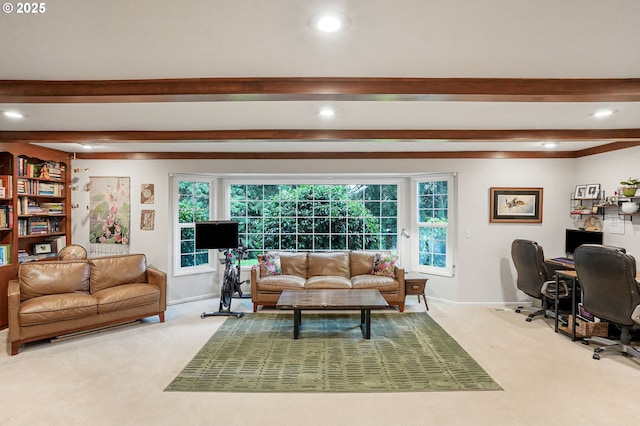 carpeted living area featuring beamed ceiling, plenty of natural light, and baseboards