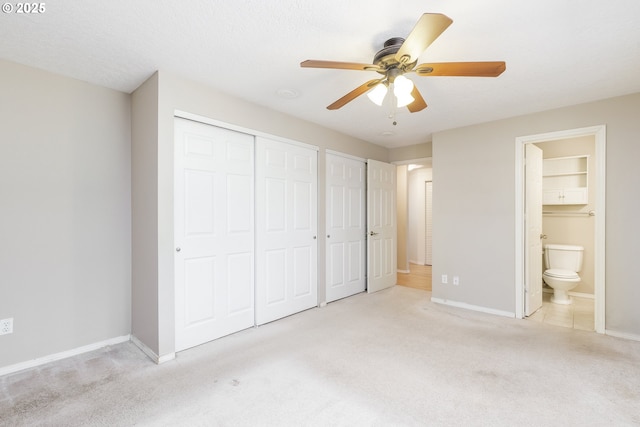 20753 SW Martinazzi Ave, Tualatin, OR 97062 - unfurnished bedroom featuring carpet flooring, multiple closets, baseboards, and ensuite bath