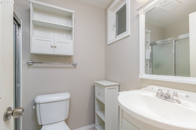 20753 SW Martinazzi Ave, Tualatin, OR 97062 - full bathroom featuring vanity, toilet, and a shower with shower door