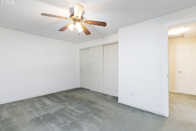 20753 SW Martinazzi Ave, Tualatin, OR 97062 - unfurnished bedroom featuring carpet floors, a closet, baseboards, and a ceiling fan