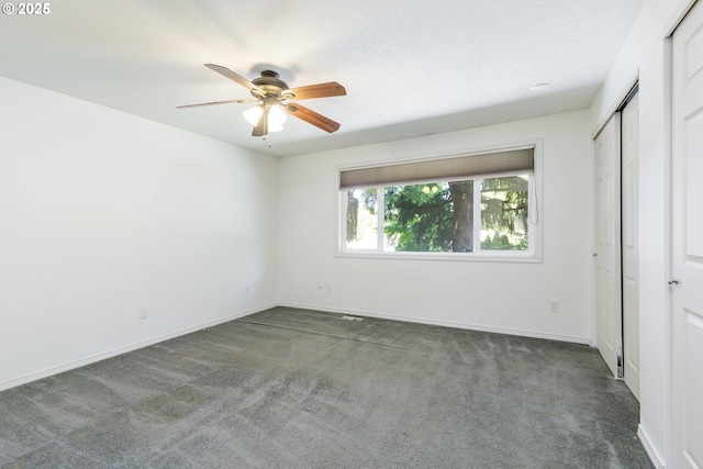 20753 SW Martinazzi Ave, Tualatin, OR 97062 - unfurnished bedroom featuring carpet flooring, baseboards, a ceiling fan, and a closet