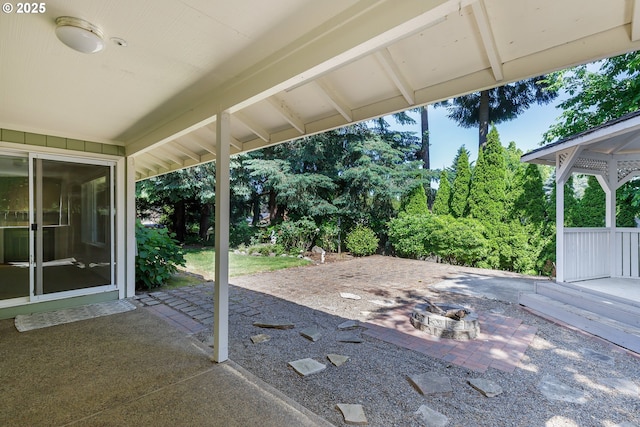 20753 SW Martinazzi Ave, Tualatin, OR 97062 - view of patio / terrace featuring a fire pit
