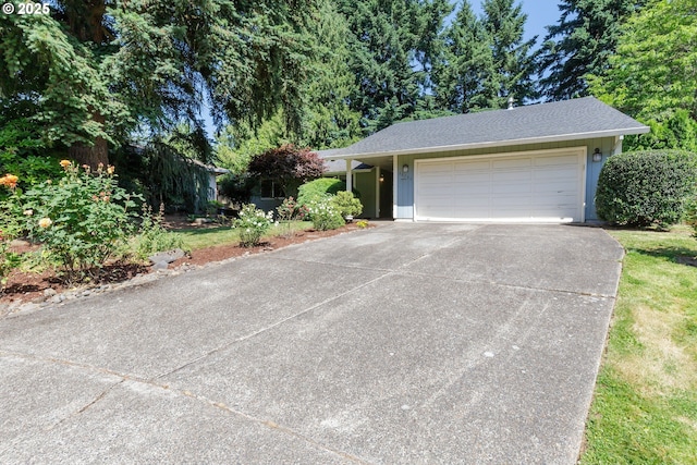 20753 SW Martinazzi Ave, Tualatin, OR 97062 - view of front of home featuring concrete driveway and an attached garage