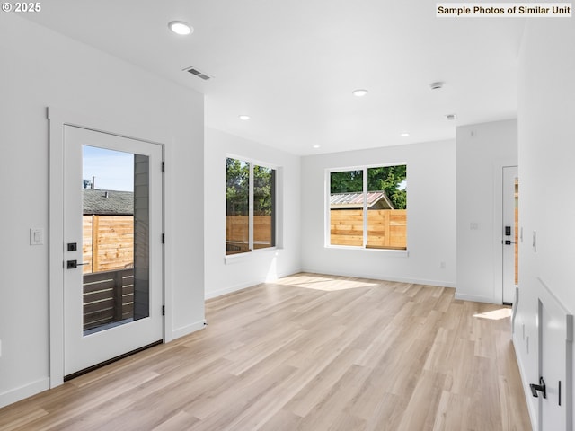 3827 N Willis Blvd, Portland, OR 97217 - spare room featuring light wood finished floors, recessed lighting, and baseboards