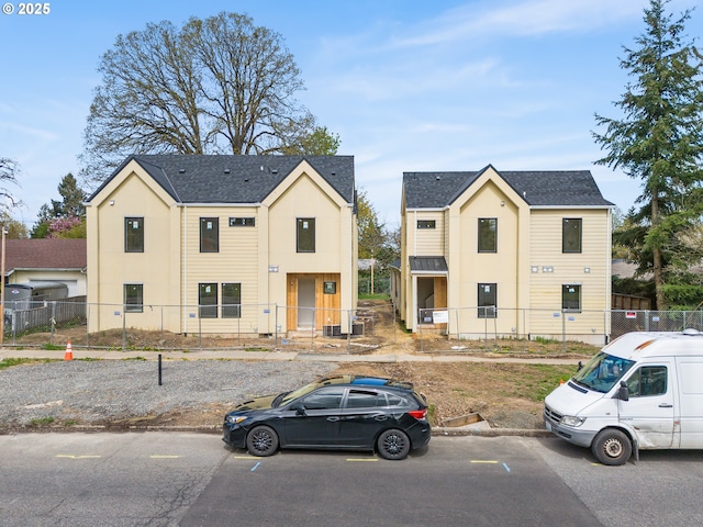 3827 N Willis Blvd, Portland, OR 97217 - townhome / multi-family property featuring roof with shingles