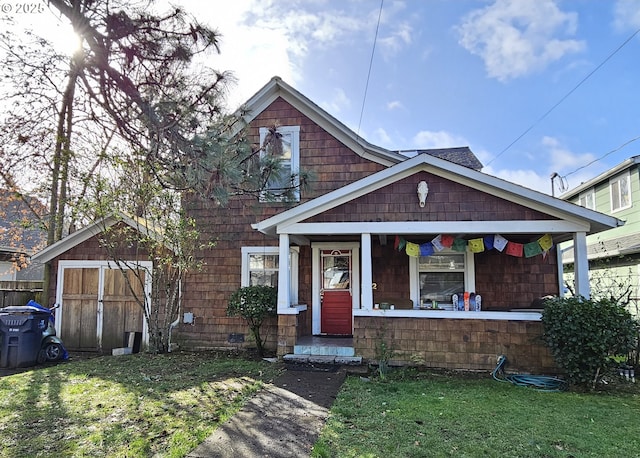 view of front facade with crawl space, covered porch, and a front yard