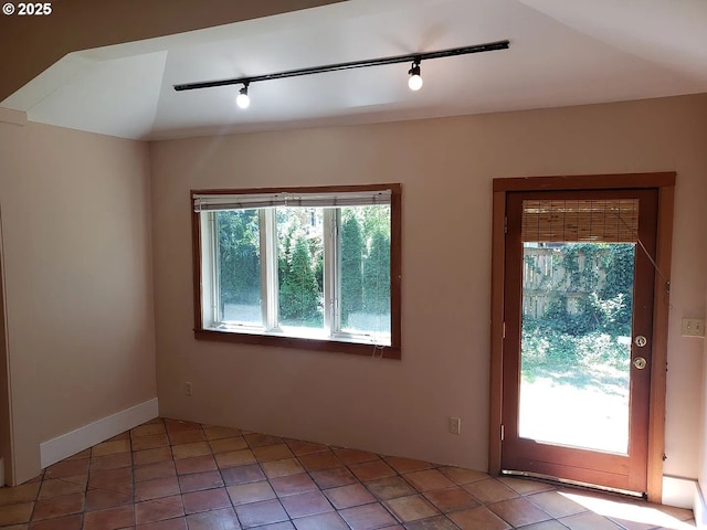 spare room featuring light tile patterned floors