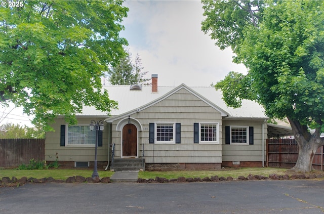 175 W Baltimore St, Heppner, OR 97836 - view of front facade with crawl space and a chimney