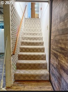 175 W Baltimore St, Heppner, OR 97836 - stairs featuring wood finished floors and wood walls
