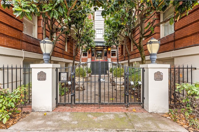 view of gate featuring a fenced front yard