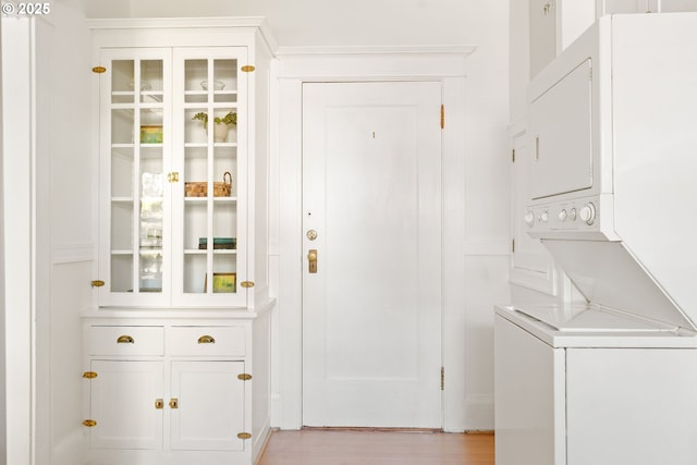 kitchen featuring a sink, stainless steel fridge, backsplash, white dishwasher, and tile countertops