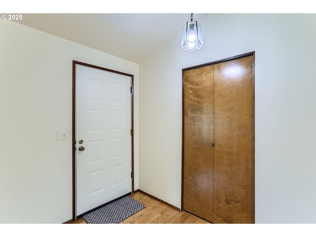 entryway with light wood-style flooring
