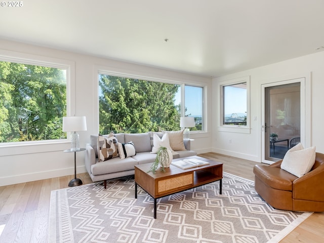790 NW Westover Sq Unit 8, Portland, OR 97210 - living area with light wood-style floors and baseboards