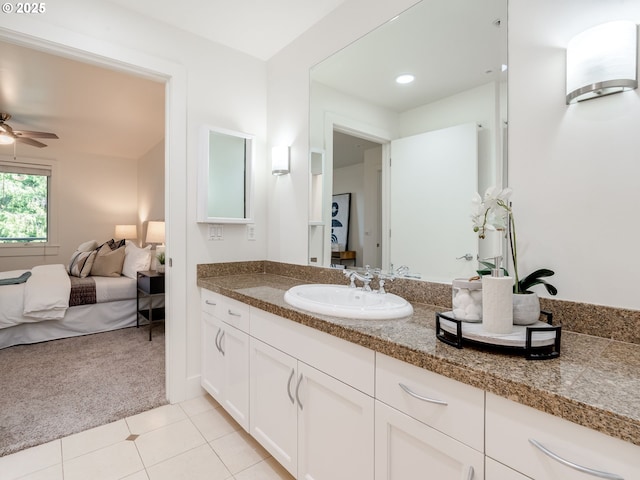 790 NW Westover Sq Unit 8, Portland, OR 97210 - bathroom featuring connected bathroom, vanity, a ceiling fan, and tile patterned flooring