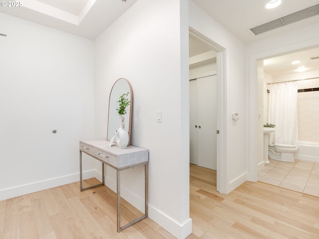 790 NW Westover Sq Unit 8, Portland, OR 97210 - hall featuring light wood-type flooring and baseboards
