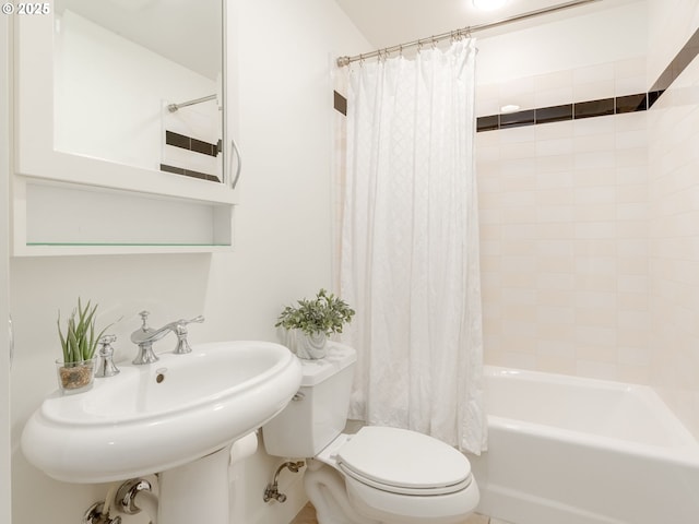 790 NW Westover Sq Unit 8, Portland, OR 97210 - full bathroom with toilet, shower / bath combo with shower curtain, and a sink