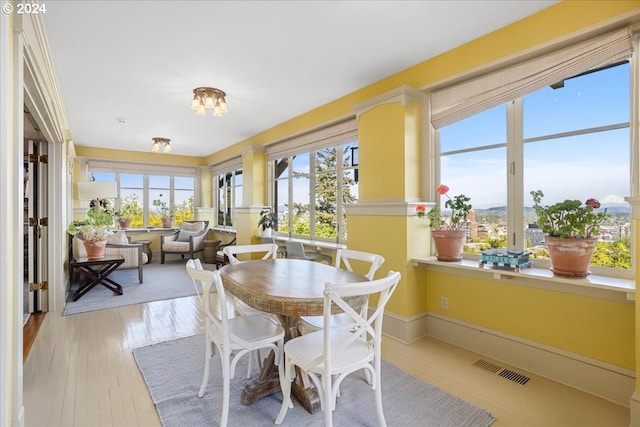 sunroom featuring a healthy amount of sunlight