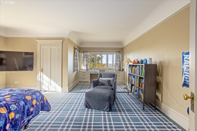 bedroom featuring crown molding