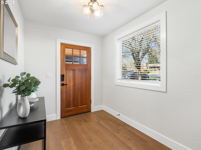 foyer with light hardwood / wood-style floors