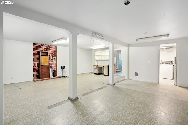 722 E 14th St, The Dalles, OR 97058 - finished basement with washer / clothes dryer, tile patterned floors, and stairway