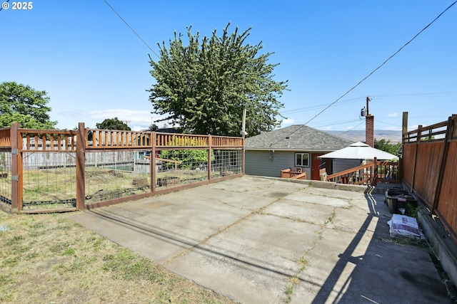 722 E 14th St, The Dalles, OR 97058 - view of patio / terrace with a gazebo and a garden