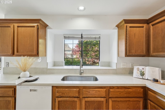 950 NW 161st Ter, Beaverton, OR 97006 - kitchen with light countertops, dishwasher, and a sink