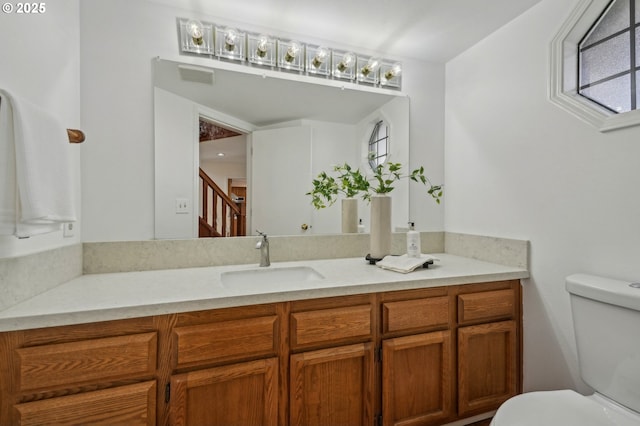 950 NW 161st Ter, Beaverton, OR 97006 - bathroom with visible vents, vanity, and toilet