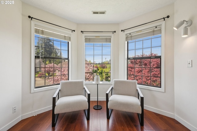 950 NW 161st Ter, Beaverton, OR 97006 - sitting room with baseboards, visible vents, hardwood / wood-style flooring, and a healthy amount of sunlight