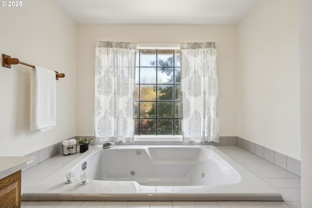 950 NW 161st Ter, Beaverton, OR 97006 - bathroom featuring a jetted tub and a healthy amount of sunlight