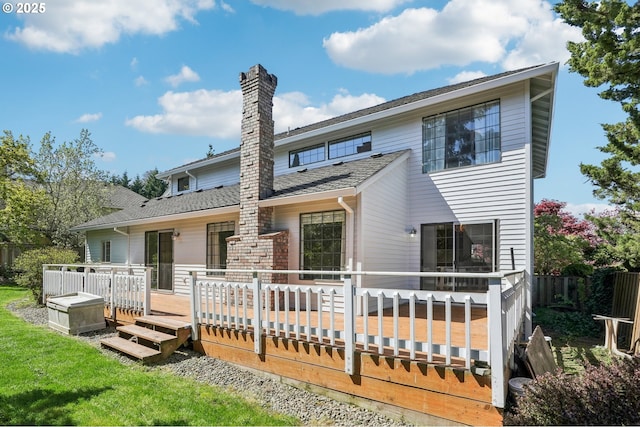 950 NW 161st Ter, Beaverton, OR 97006 - back of house featuring fence, a chimney, a yard, and a deck