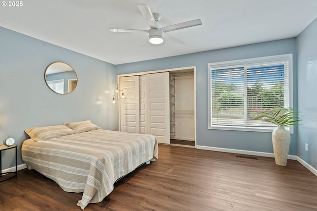 4935 NW Kahneeta Ct, Portland, OR 97229 - bedroom featuring wood finished floors, a closet, and a ceiling fan