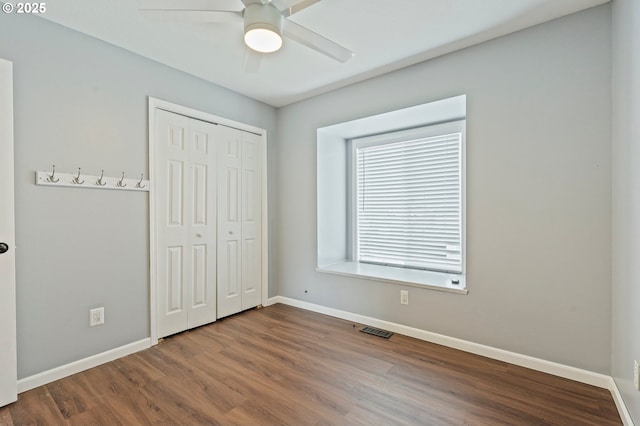4935 NW Kahneeta Ct, Portland, OR 97229 - unfurnished bedroom featuring wood finished floors, a closet, and ceiling fan