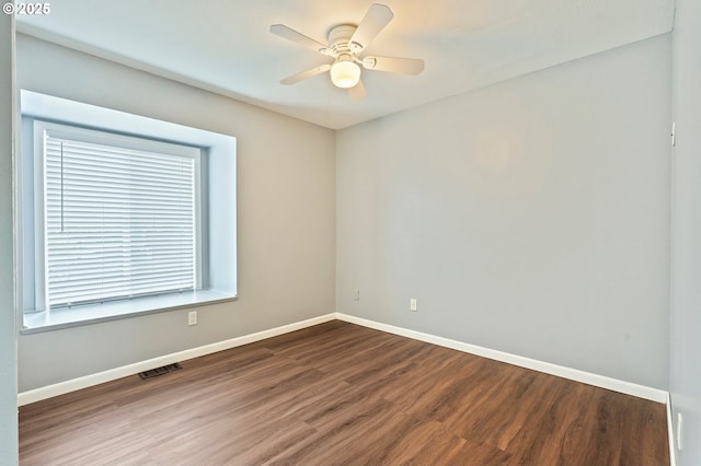 4935 NW Kahneeta Ct, Portland, OR 97229 - spare room featuring dark wood-type flooring and ceiling fan