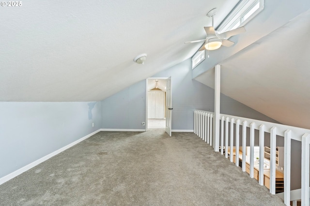 4935 NW Kahneeta Ct, Portland, OR 97229 - bonus room with lofted ceiling, carpet floors, and a ceiling fan