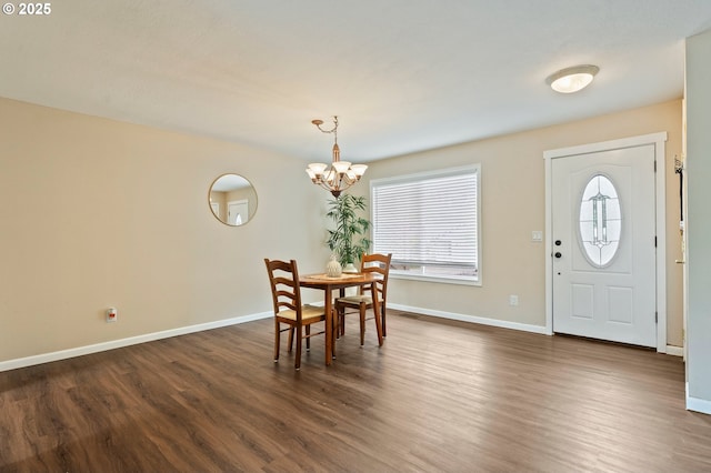 4935 NW Kahneeta Ct, Portland, OR 97229 - dining area with dark wood-style floors and a chandelier