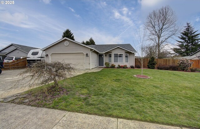 ranch-style home featuring a front yard, concrete driveway, fence, and an attached garage