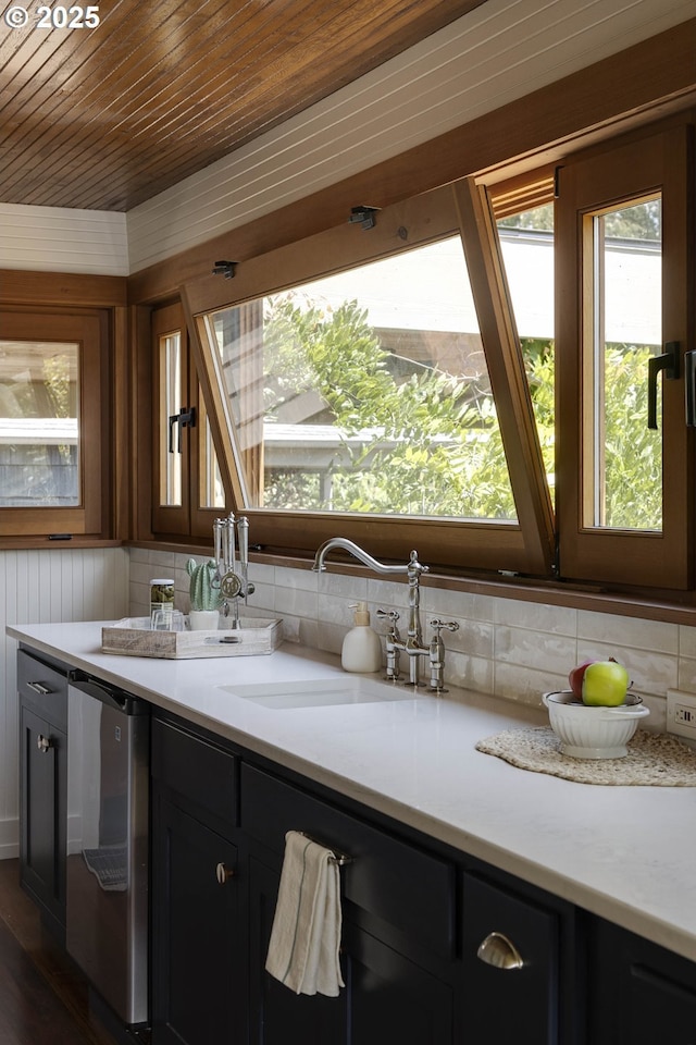 1040 S Park St, Carlton, OR 97111 - kitchen featuring wood ceiling, light countertops, dishwashing machine, dark cabinetry, and dark wood-style floors
