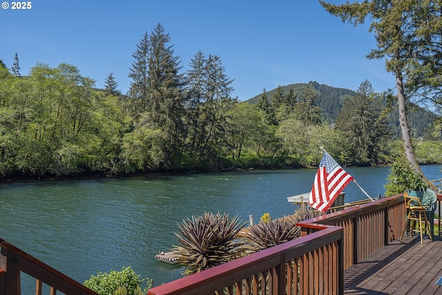 3419 S Ballard Ln, Lincoln City, OR 97367 - water view featuring a heavily wooded area and mountains