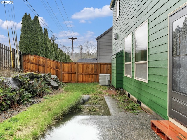 view of yard featuring cooling unit